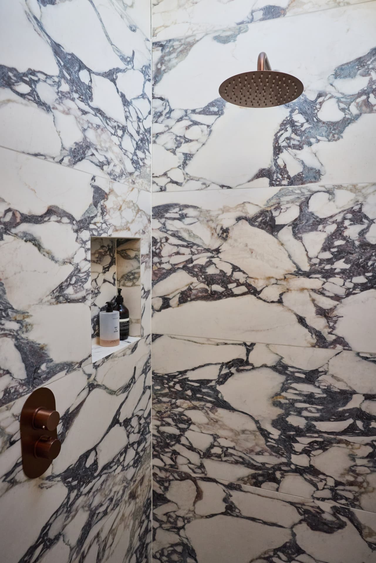 Walk-in marble shower at Cambridge Terrace